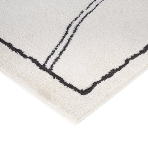 4' X 6' Ivory And Black Geometric Area Rug